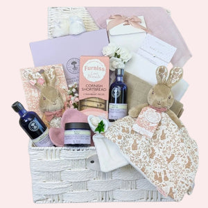 New Mum Gifts Hamper Basket filled with luxury skincare, baby presents. Designed by Bumbles and Boo. 