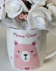 new mum gifts bouquet which includes mittens, socks and bandana bibs.