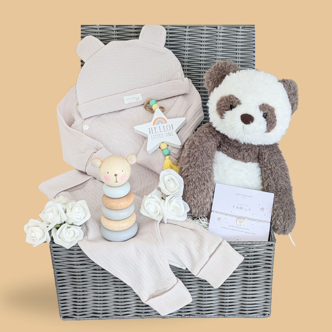 new mum hamper to include silver bracelet for mum, organic clothing set for baby and wooden teething toy.