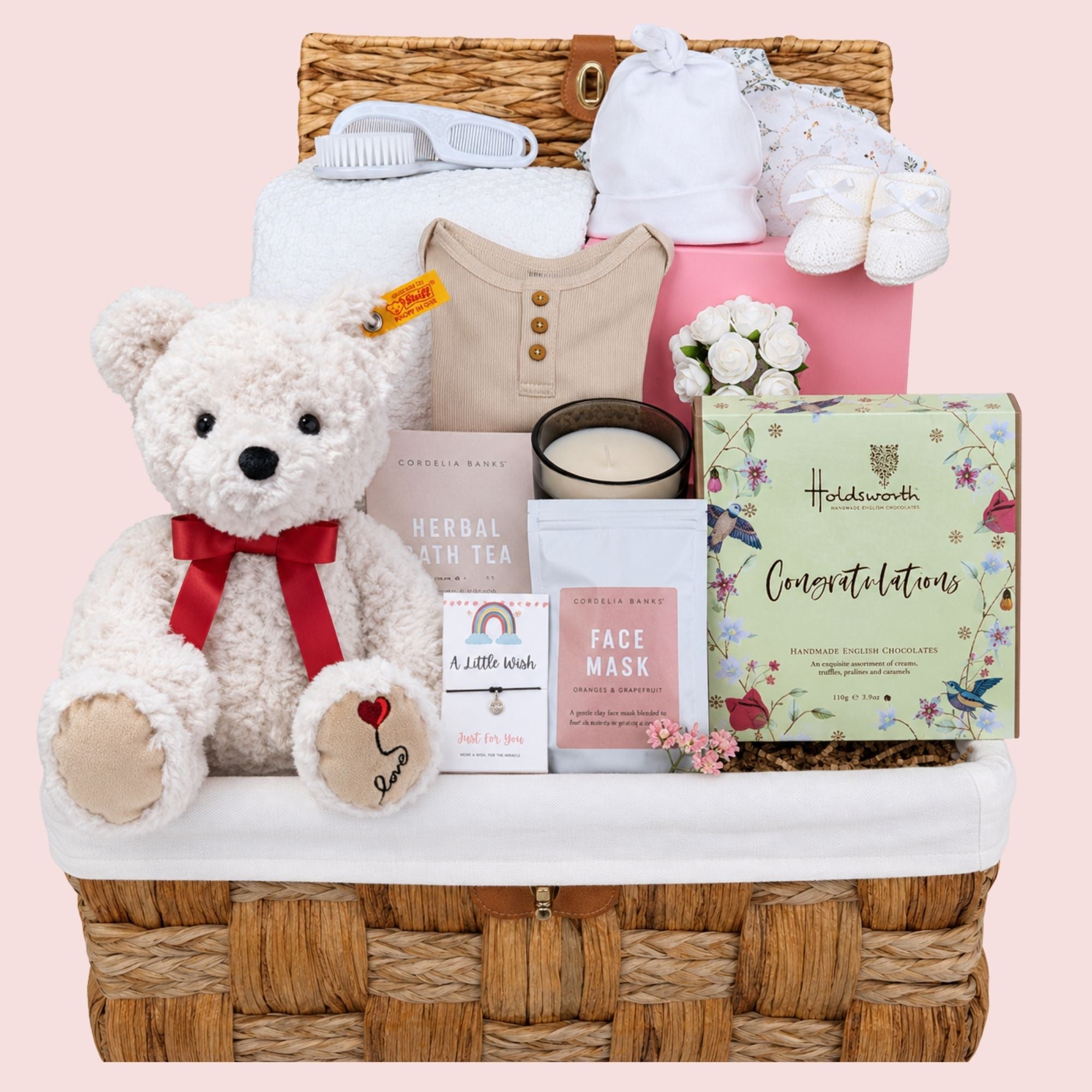 New mum gifts hamper with white steiff teddy bear and gifts for mum packed in a basket by Bumbles and Boo.