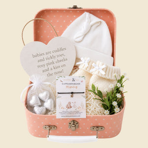 New mum gifts hamper with jewellery, chocolate, booties, hat and baby keepsake plaque designed by bumbles and boo.