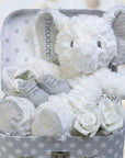 new mum and baby keepsake hamper with elephant soft toy, baby scratch mittens and baby booties candles for mum.