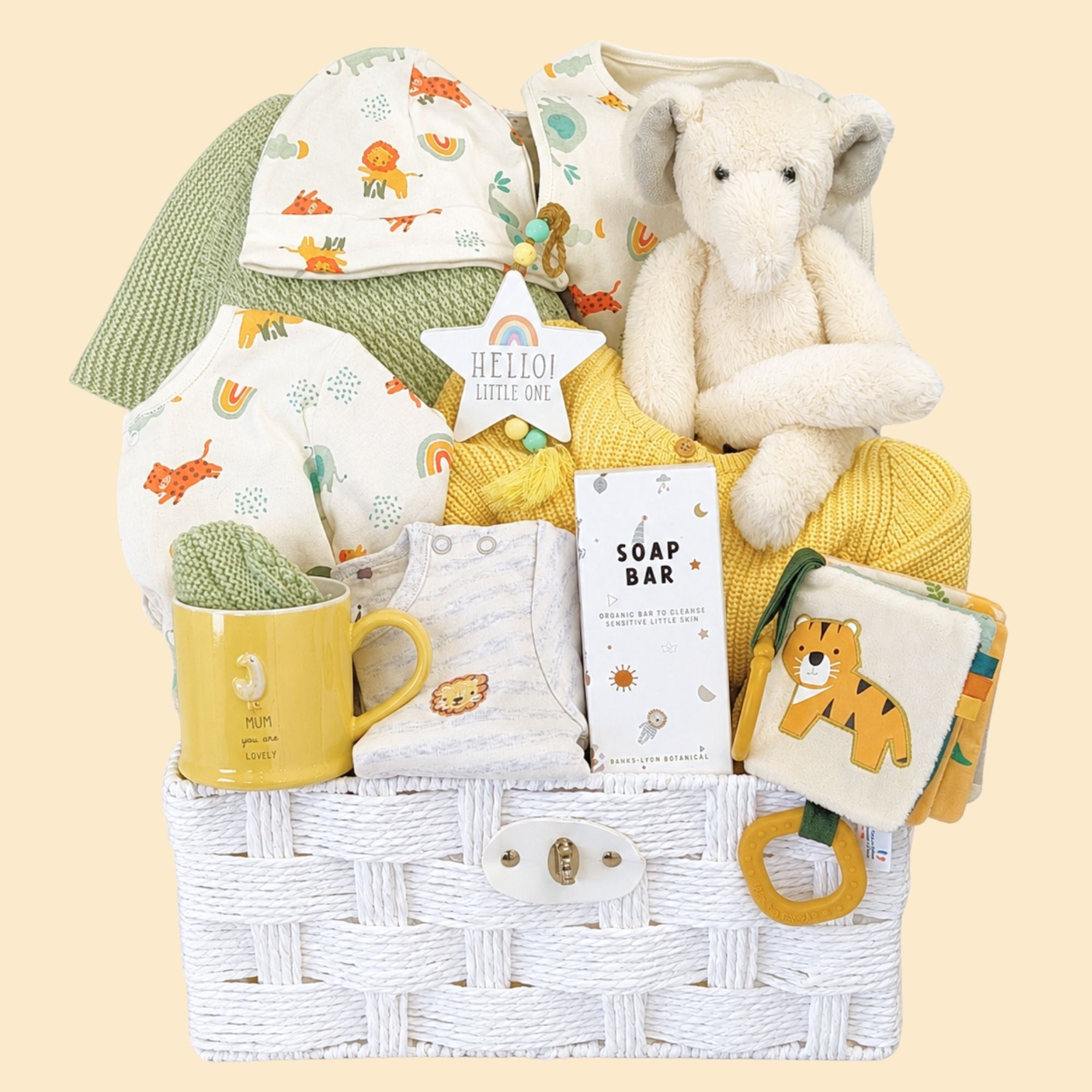 A new mummy gifts hamper with a yellow and green theme plus elephant and activity book.