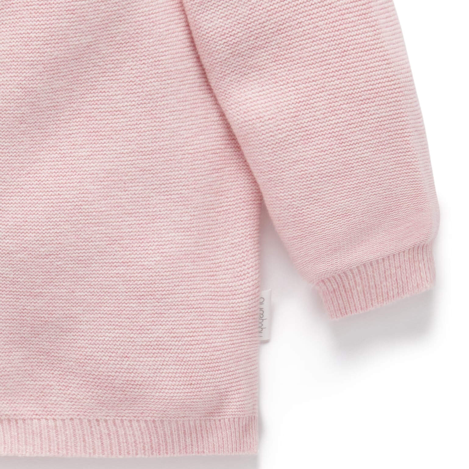 Knitted pink baby cardigan with buttons