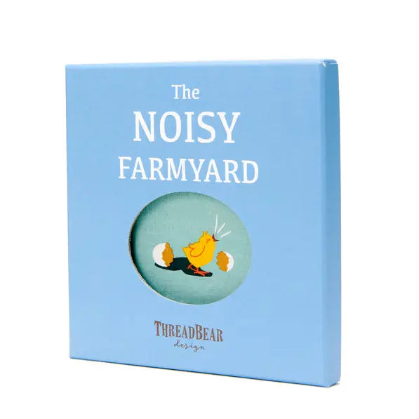 A soft cloth book featuring characters from the  farmyard