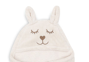 Oatmeal baby wrap blanket with bunny head detail and teddy fleece lining