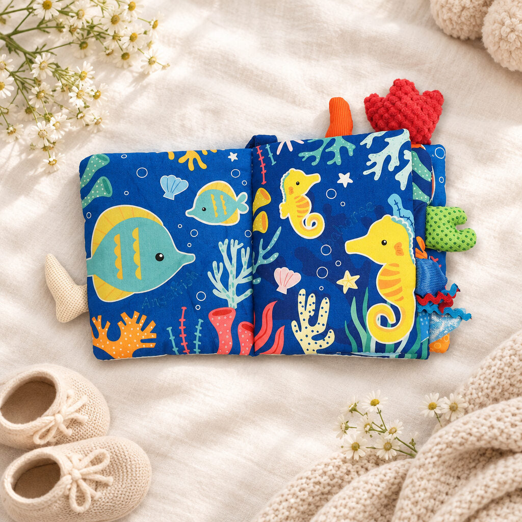 Ocean Fun cloth baby book open to colourful sensory pages