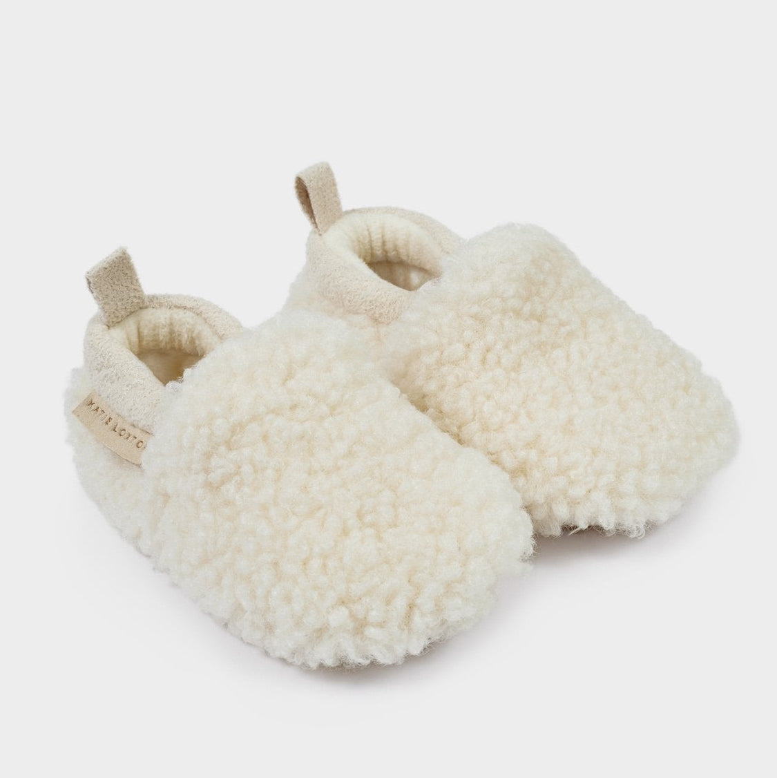 Pair of off white Borg Baby Shoes with suedette trim