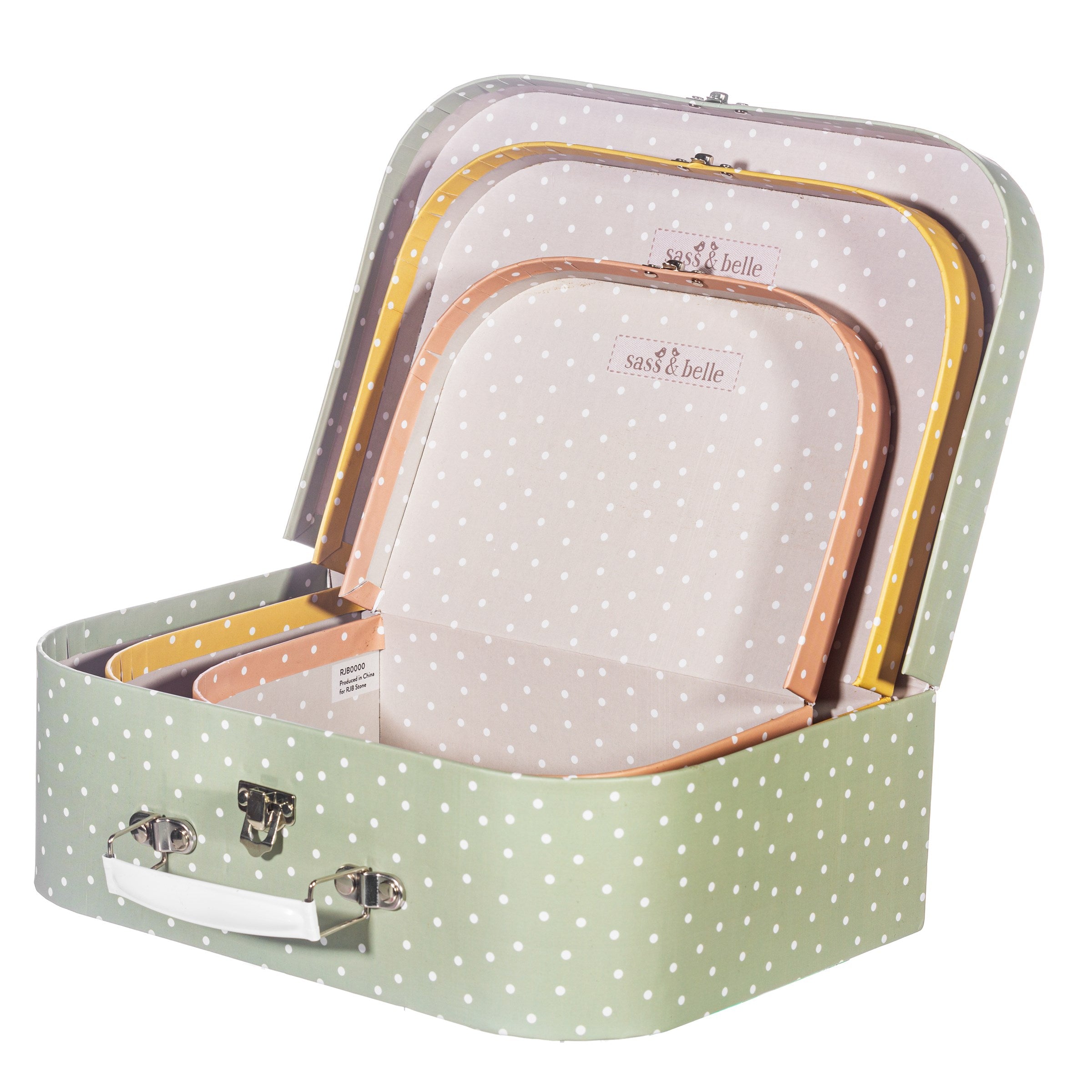 open large spotted cardboard suitcase with smaller cases inside
