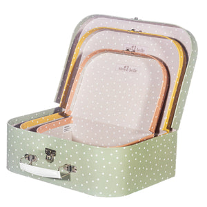 open large spotted cardboard suitcase with smaller cases inside