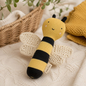 Organic cotton bumble bee baby rattle with knitted wings in yellow and black
