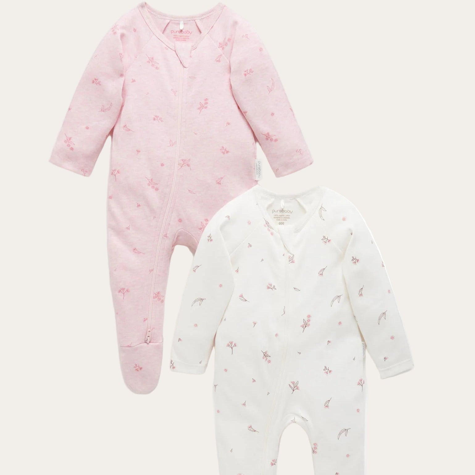 Soft zip-up baby sleepsuits in blossom pink