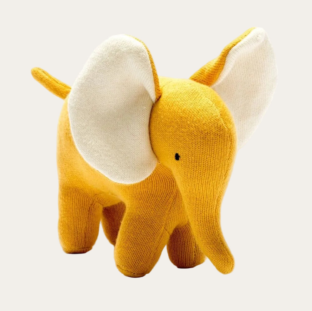 Organic cotton elephant baby soft toy in mustard yellow with knitted texture