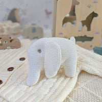 white organic knitted elephant baby rattle