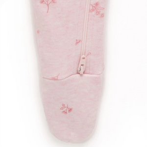 Close up of organic cotton pointelle fabric on pink blossom baby growsuit