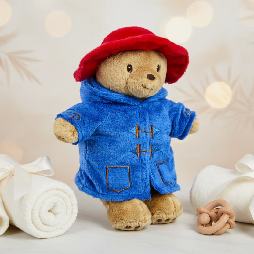 Paddington baby teddy bear soft toy wearing red hat and blue coat, plush baby toy suitable from birth.
