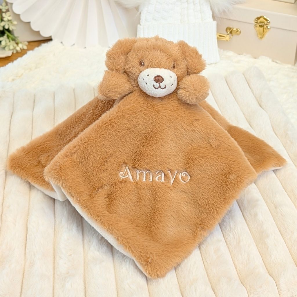 Personalised baby comforter with a classic brown puppy plush toy attached. Embroidered with the name Amayo