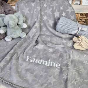 Personalised grey stars baby blanket with Pom Pom trim. 