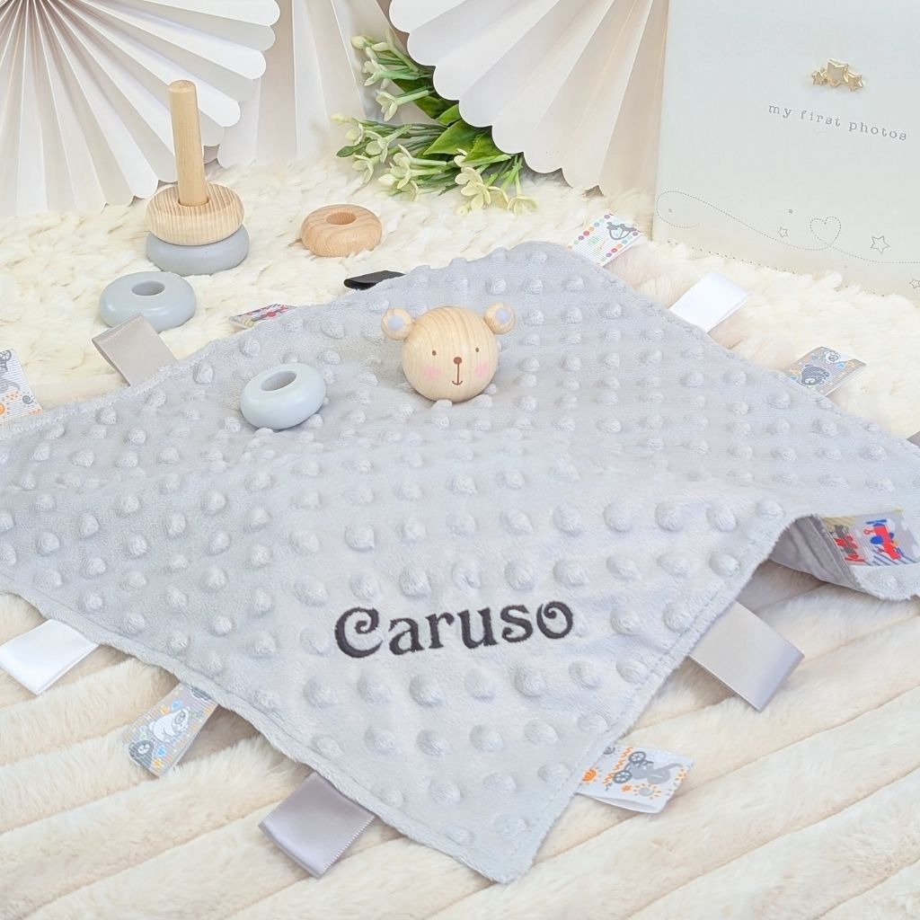 Personalised baby comforter taggie toy in grey with embroidered name 'Caruso', personalised baby gift