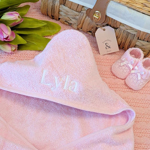 Personalised baby towel in pink with a customised name embroidered on the hood