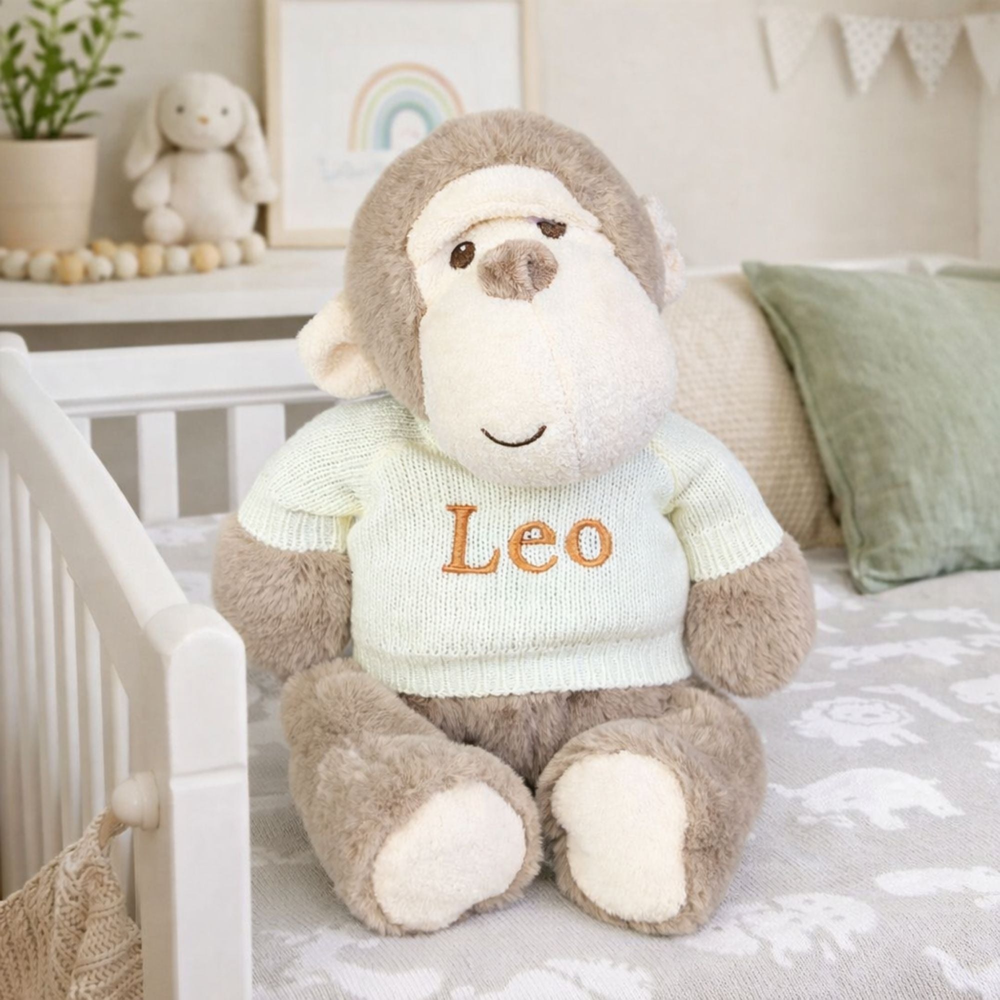 Personalised monkey soft toy with a custom name embroidered on the jumper