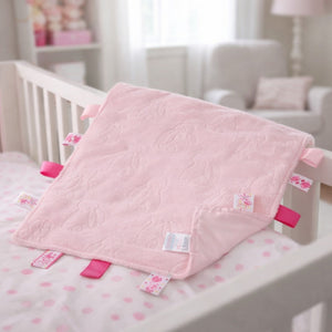 Pink embossed bunny taggie comforter blanket.