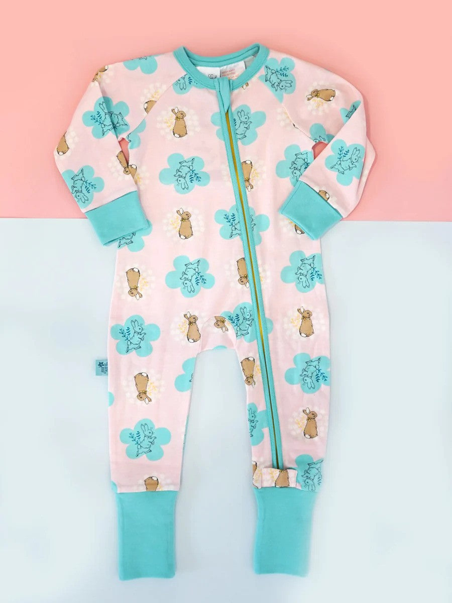 Pink and teal zip-up baby romper