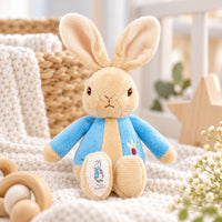 Peter Rabbit baby rattle soft toy, filled with beans, wearing a blue coat