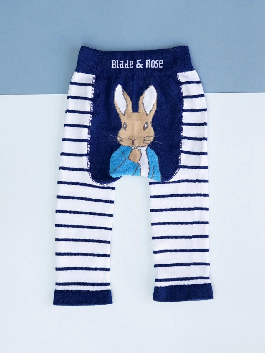 White and navy striped leggings with a Peter Rabbit print on the bottom
