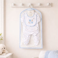 Peter rabbit new baby clothing set in white and blue with a bunny motif on the bib and bunny rabbits on the clothing.