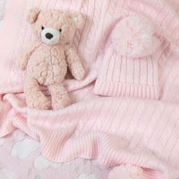 Pale pink knit baby blanket and Pom Pom hat set