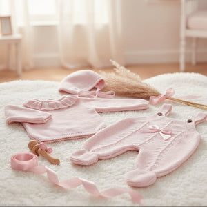 Pink baby dungaree set with knitted top, bow detail and matching hat