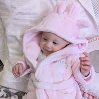 Personalised pink baby dressing gown with cute ears.