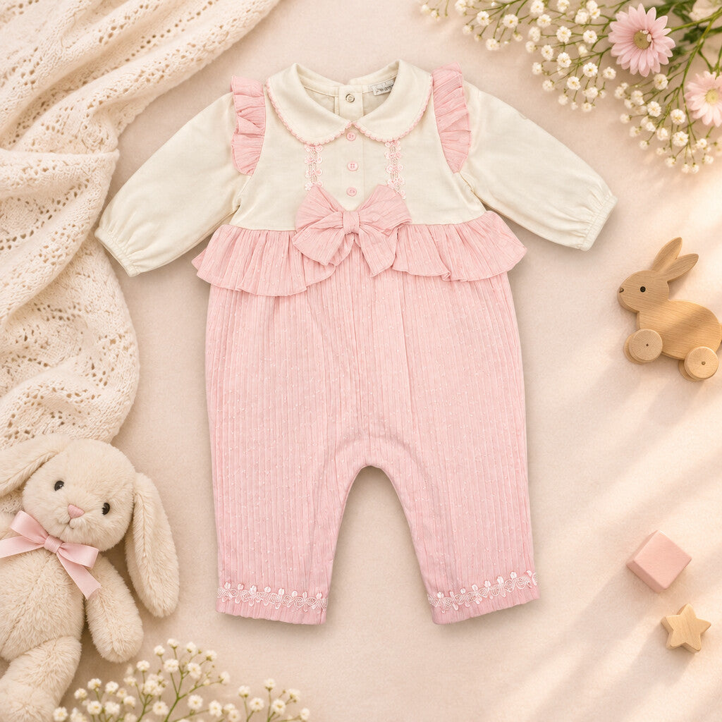 Pink baby girl romper with lace appliqué and bow detail