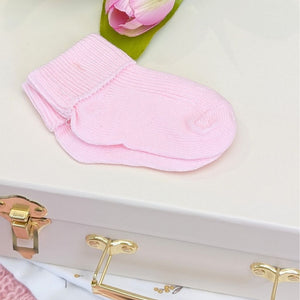 Pink baby socks with a turnover. Soft cotton.