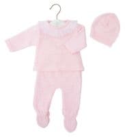 Pink knitted top and footed leggings on a hanger, with the matching hat displayed alongside.