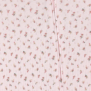 Pink floral baby romper with pointelle texture and ribbed trims
