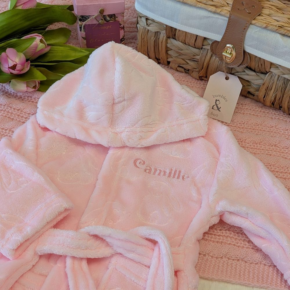 Pink plush robe with embossed bunny rabbits