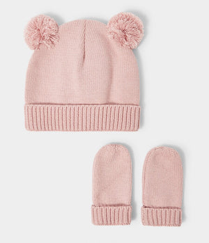 Pink hat with pompoms and knot mittens from Katie Loxton