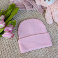 Pink baby beanie hat in knit.