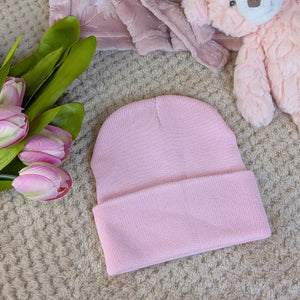 Pink baby beanie hat in knit.