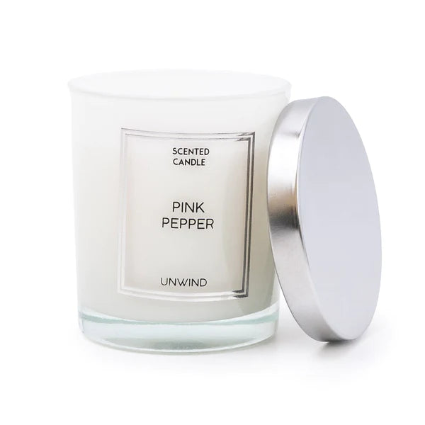 A simple classic white candle in a lidded jar with silver lid with a pink pepper aroma