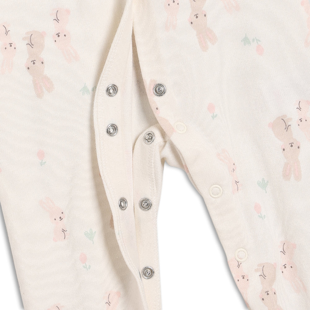Close up of the poppers on the legs of the sleepsuit.