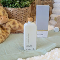 Pregnancy body oil called nourish.