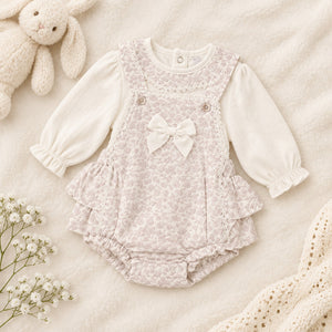 Purple and cream baby girl pinafore set with jacquard and bow detail