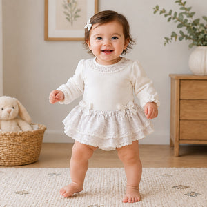 Purple jacquard skirt and cream bodysuit baby girl set