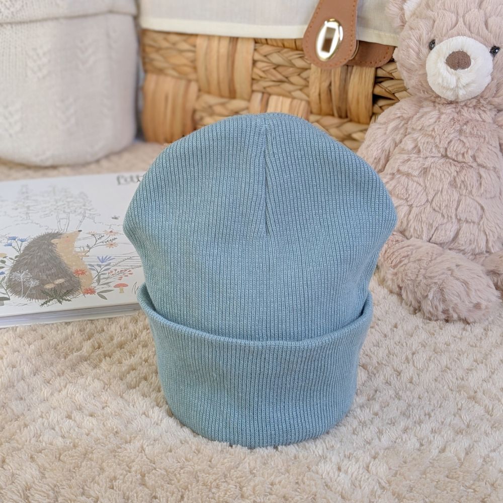 sage green knit baby hat.