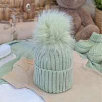 Knitted mint sage green hat with fluffy pompom
