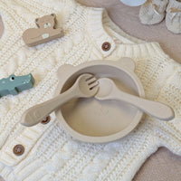 Silicon baby bowl, spoon and fork feeding set made of beige silicon