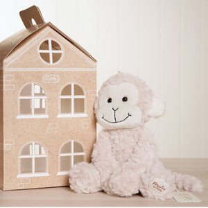 Plush monkey soft toy shown in sitting position